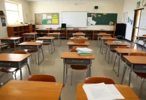 Empty classroom in Arizona school symbolizing closure issues